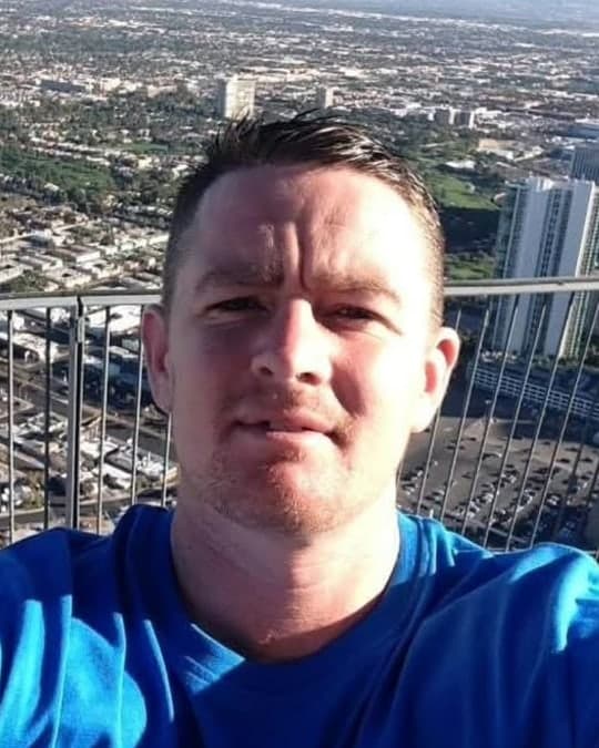 Ian Rowson of S.I.R Scaffolding, in a blue t-shirt